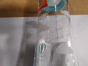 NUK Klasiskā stikla pudelīte ar silikona knupi - Mākoņi, līdz 6mēn., 240ml; SD08